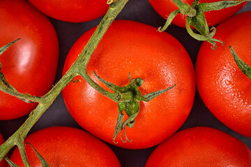 Close up of trusses of small ripe tomatoes