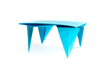 Craft table origami  on a white background. Japanese traditional Origami paper table