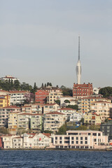 Obraz premium Asian part of Istanbul city and Camilla hill with modern TV tower. View from a cruise ship on Bosporus Strait. Istanbul, Turkey