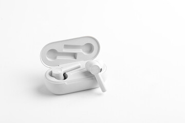 Air Pods or ear bud with Wireless Charging Case.