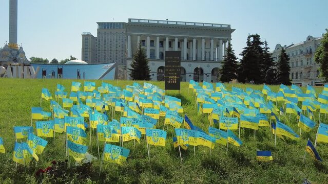 Ukrainian flags with the names of people who died as a result of the Russian invasion on the Independence Square, Kyiv, Ukraine.