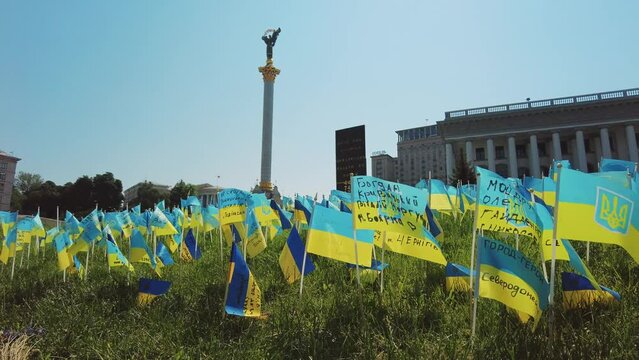 Ukrainian flags with the names of people who died as a result of the Russian invasion on the Independence Square, Kyiv, Ukraine.