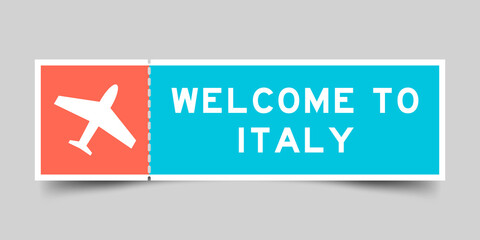 Orange and blue color ticket with plane icon and word welcome to italy on gray background