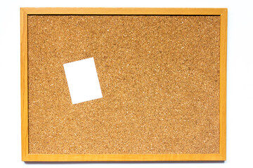 Fototapeta premium Corkboard with white note paper placed on white background with copy space