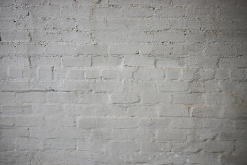 Painted grey brick wall