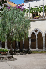 Fototapeta na wymiar Cloister of San Francesco. The courtyard of the old Catholic monastery.