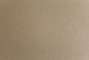 Fototapeta na wymiar Paper background close up. Horizontal vintage brown craft paper texture.