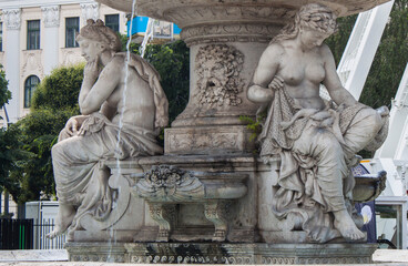 Ancient stone figures close up, detail of the Danubius Fountain, located in Erzsebet square, in the old town of Budapest, Hungary, Europe. The fountain is symbolizing Hungary's rivers.