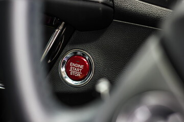 Close up engine car start button. Start stop engine modern new car button,Makes it easy to turn...