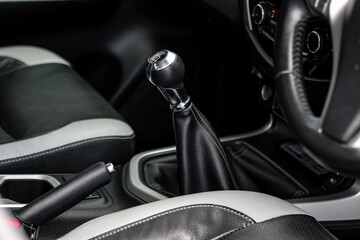 automatic transmission shift selector in the car interior. Closeup a manual shift of modern car...