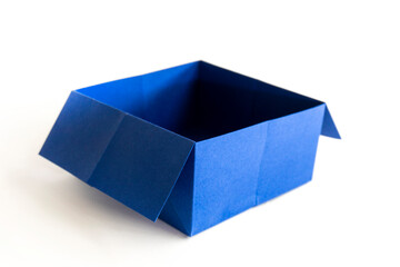 Blue origami box on the white background