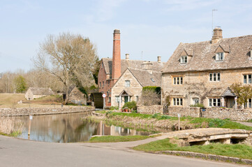 Fototapeta na wymiar Old watermill at Lower Slaughter, Cotswolds, England