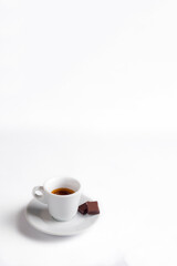 Obraz na płótnie Canvas white coffee cup with chocolate on white background, Cup of espresso.