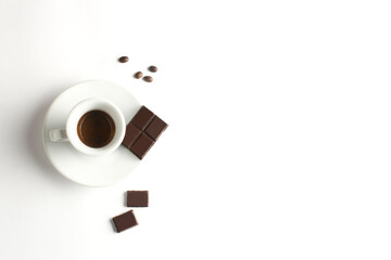 Cup of coffee with chocolate  on white background. Cup of espresso.Top view