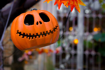 Craved pumpkin head jack lantern is decorated with scary theme in Halloween holiday.