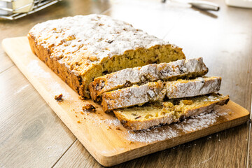 cake with dried fruits on a wooden surface. food concept