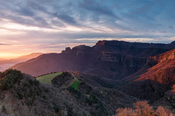 Sunrise with beautiful colors in the sky. (Peak of Puigsacalm, Garrotxa, Spain)