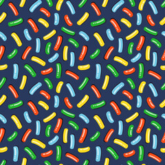 Seamless pattern with dark donut icing with lots of decorative bright sprinkles. Vector illustration of colorful candy sprinkles for fabrics, textures, wallpapers, posters, cards.