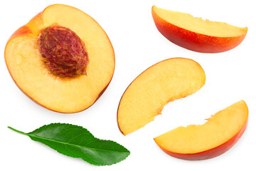 sliced peach fruit with green leaf isolated on white background. clipping path. top view