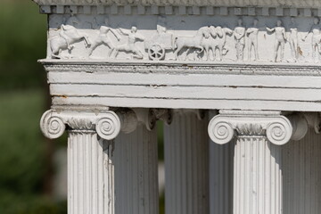 Elements of architectural decorations of buildings, columns and tops, arches and gypsum stucco...