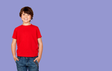 Cute brunette boy in red t shirt