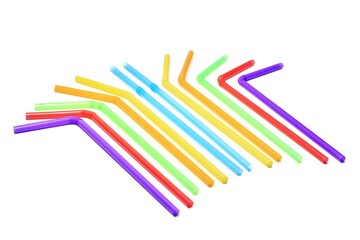 Fototapeta premium Blue, yellow, orange, green, red and blue drinking straws are placed on a white background. Take a photo from below