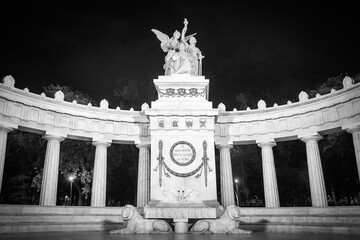 The Juarez Hemicycle in black and white at Alameda Central Park in downtown Mexico City, Mexico -Neo-classical marble monument dedicated to Benito Juarez, the first indigenous president.