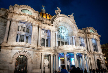Palacio de Bellas Artes (Palace of Fine Arts)-Dramatic marble performance hall, exhibition venue, museum and theatre in Mexico City, Mexico-A historic building beautifully Illuminated at night.