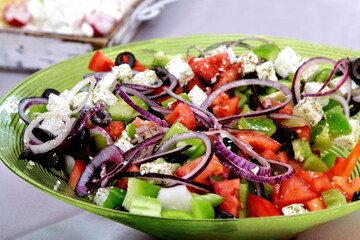 greek salad on a green plate