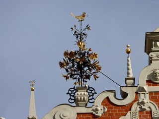 Decoration on the facade of Black Heads house in Riga, Latvia. Elaborate metal flower bouquet and...