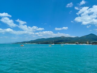 Rocks, beaches and beautiful turquoise sea water. Tranquility of turquoise sea water. Beautiful landscape. Composition of nature.