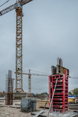 Crane and wall formwork at housing construction