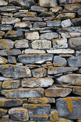 Old castle stone wall texture background.  Vertical shot
