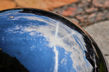 the sky in a ball of metal