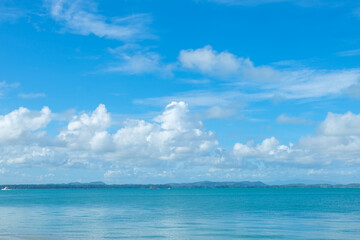Fototapeta premium Turquoise sea background with blue sky fluffy cloud nature landscape