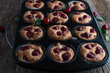 Cherry muffins fresh and homemade baked  in a baking pan