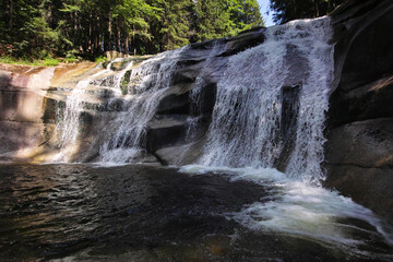 Waterfal called Mummelfall on a river Mummel in Giant Mountains, Harrachov, Czech Republic