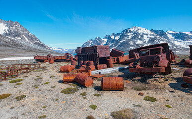 An abandoned US military base litters - Thousands of oil drums scattered across the land,  Greenland