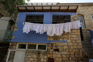 Laundry drying on the street in a big city