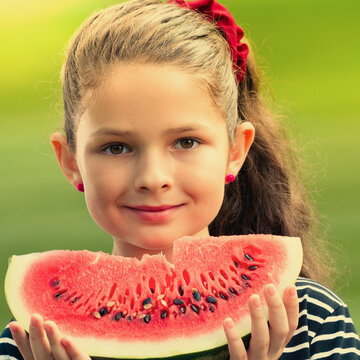 Portrait photo of girl eating slice of watermelon, outdoors. Square composition image.