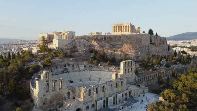Aerial view of the Acropolis in Athens at the sunset - tilt up