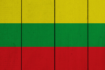 Patriotic wooden plank background in colors of flag. Lithuania