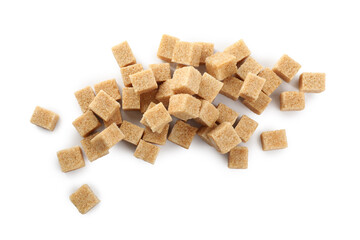 Pile of brown sugar cubes on white background, top view
