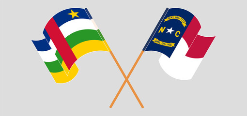 Crossed and waving flags of Central African Republic and The State of North Carolina