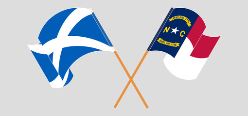 Crossed and waving flags of Scotland and The State of North Carolina