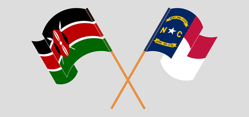 Crossed and waving flags of Kenya and The State of North Carolina