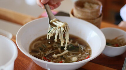 Mushroom curry, clear tom yum soup, northeastern food