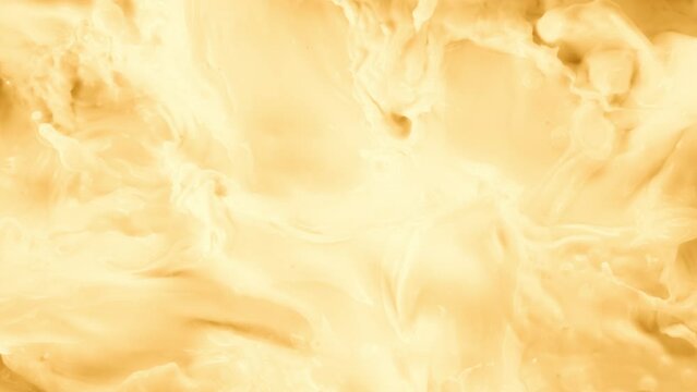 Super Slow Motion Shot of Splashing Fresh Vanilla Milk Liquid at 1000 fps.