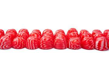 Red round tasty gummy candies islolated on a white background.