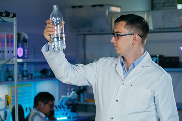Scientist is analysing and testing a water concept.